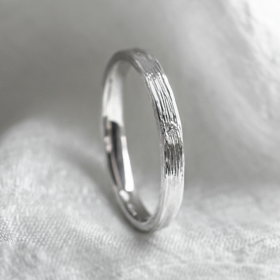 Original wedding ring with tree bark surface NIXON