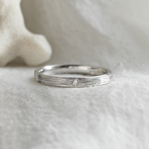 Original wedding ring with tree bark surface NIXON