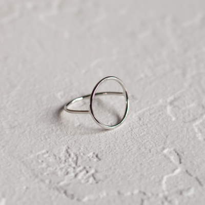 Minimalistic gold ring with the circle NORE