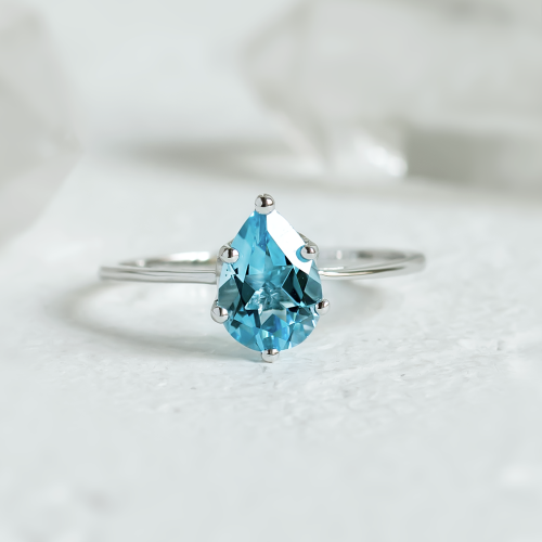 Gold ring with blue topaz OLLY