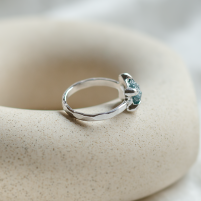 Gold ring with blue raw diamond and hammered surface SEA