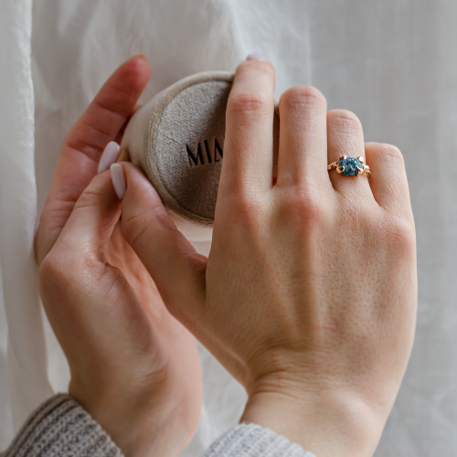 Gold ring with blue raw diamond and unusual rim SKY