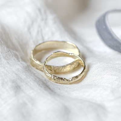 Gold wedding bands with moon surface APOLLO