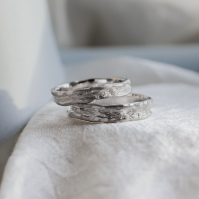 Unusual wedding rings with natural surface ARETA