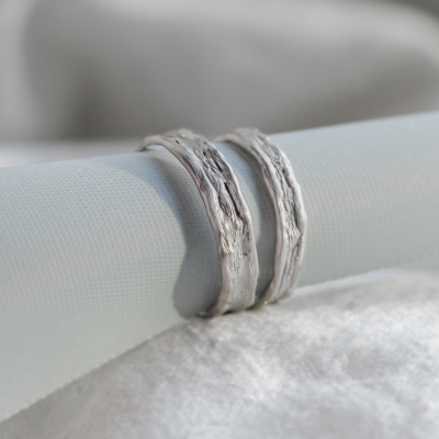 Unusual wedding rings with natural surface ARETA
