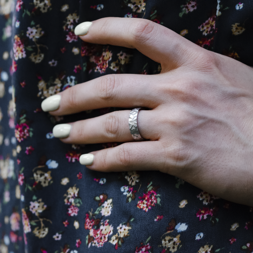 Gold wedding rings with a relief surface FIO