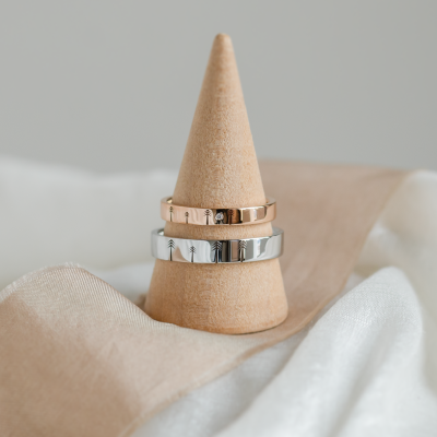 Gold wedding rings with engraved trees FORI