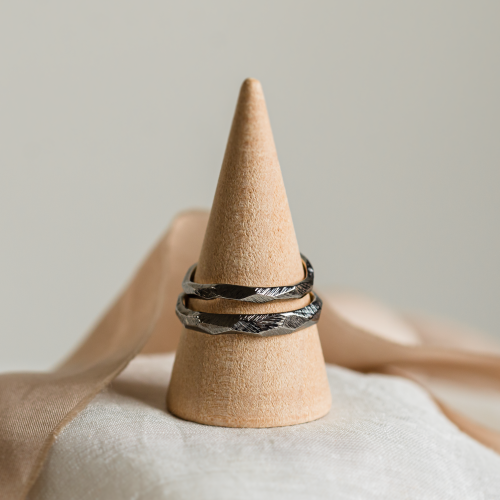 Black hammered wedding bands in organic shape GOLEM