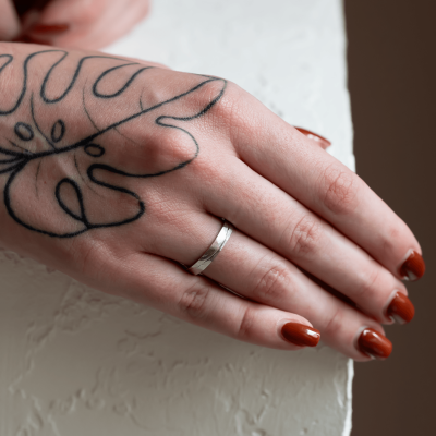 Gold hammered wedding rings with line LIDO
