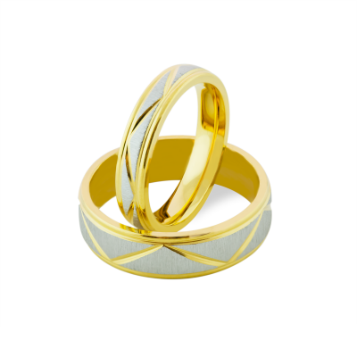 LUND combination gold marriage rings with geometrical lines on