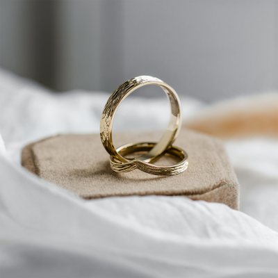 Gold wedding rings with natural surface SIENA