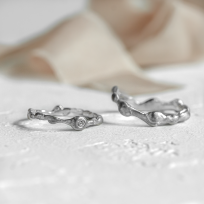 Curved wedding rings with diamond STIBI