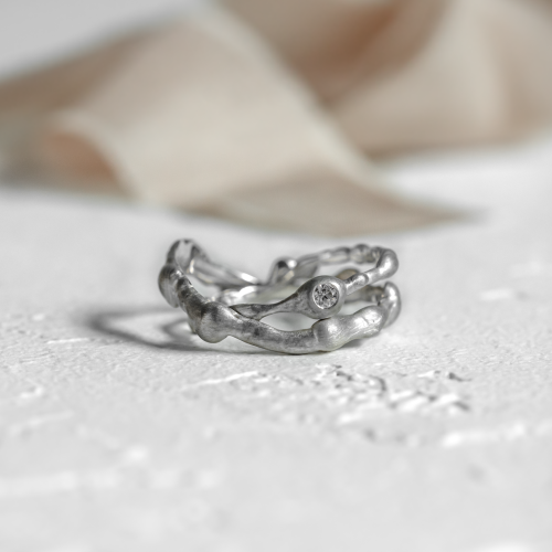 Curved wedding rings with diamond STIBI