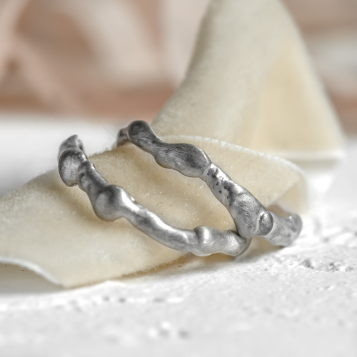 Curved gold wedding rings ZINC